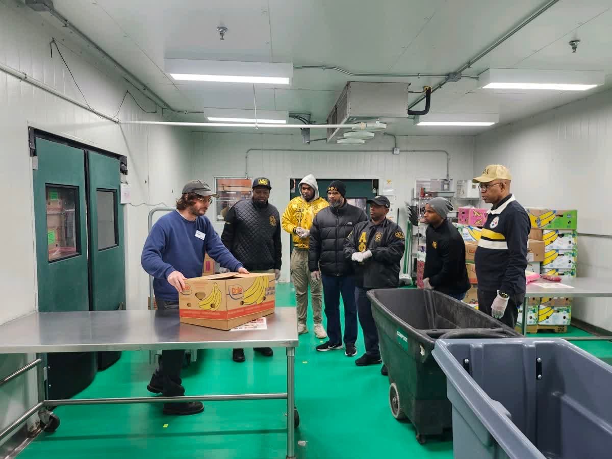 Caring and Sharing team touring Food Gatherers operations