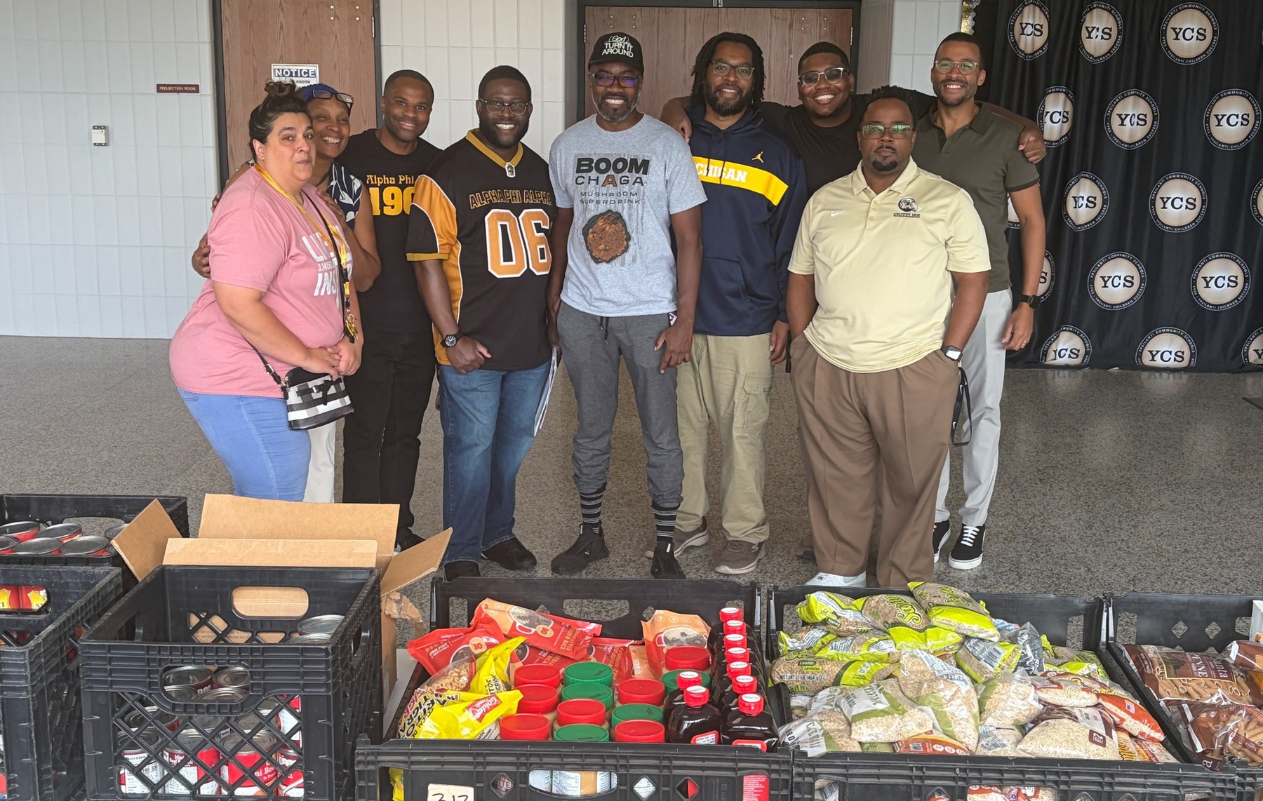 Caring and Sharing volunteers and community partners serving at the YCMS Healthy School Pantry